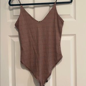 Stripped body suit